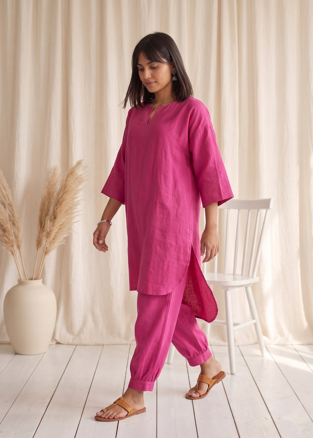 Drift Kurta Co-ord Set in Cerise Pink by Jamies, walking with side slit open