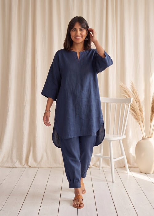 Drift Kurta Co-ord Set in Denim Blue by Jamies, walking with a candid smile