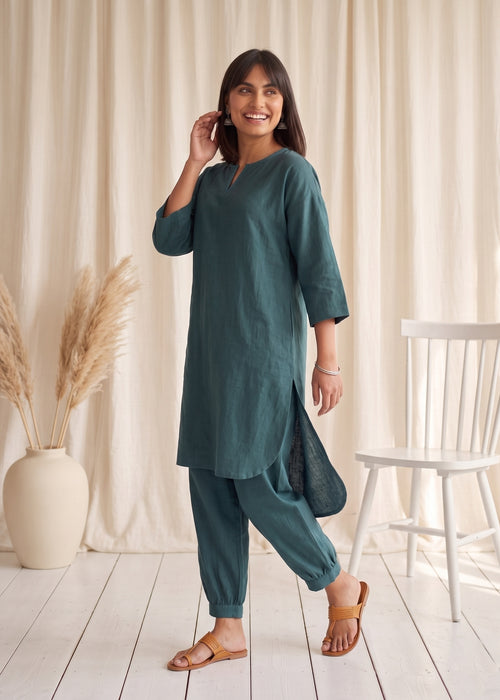 Drift Kurta Co-ord Set in Ocean Green by Jamies, walking with curved back hem