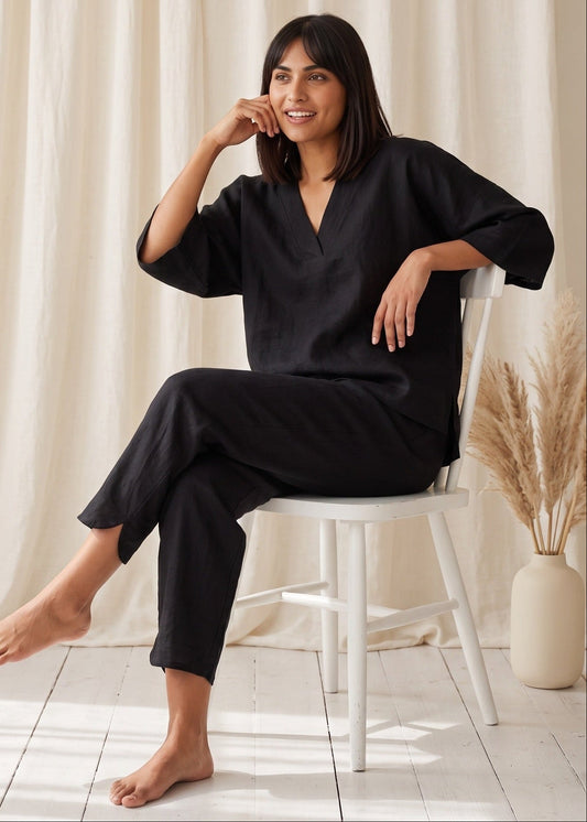 Tide Turn-Around Co-ord Set in Black by Jamies, seated, V-neck at the front