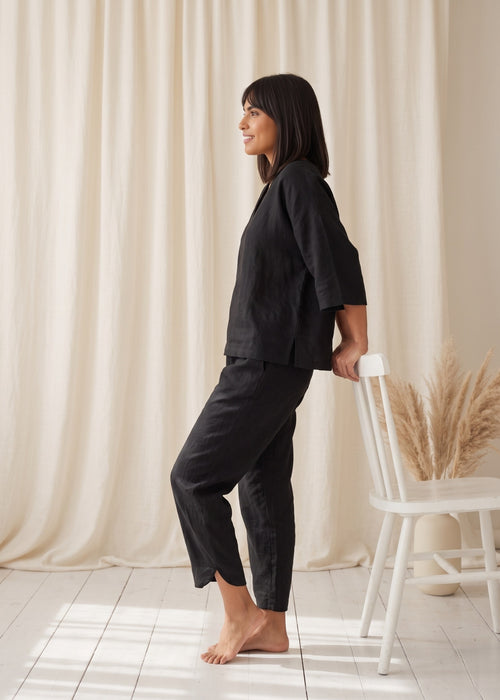 Tide Turn-Around Co-ord Set in Black by Jamies, side profile with barrel trousers